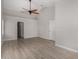 Spacious bedroom featuring vaulted ceilings, wood-look floors, and ample natural light at 4525 E Desert View Dr, Phoenix, AZ 85044