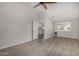 Bedroom with vaulted ceilings, wood-look floors and easy access to other rooms at 4525 E Desert View Dr, Phoenix, AZ 85044