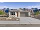 Beautiful single-story home with desert landscaping, mountain views, and a two-car garage at 46378 W Lander Ln, Maricopa, AZ 85139