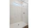 Modern shower with sleek showerhead and neutral surround at 46378 W Lander Ln, Maricopa, AZ 85139