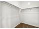 Spacious walk-in closet with carpet and shelving for ample storage at 46378 W Lander Ln, Maricopa, AZ 85139