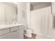 Fresh bathroom featuring a modern vanity with gray cabinets and a shower with gray subway tile at 5100 E Rancho Paloma Dr # 2078, Cave Creek, AZ 85331