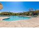 Community pool area featuring ample seating and desert landscaping at 5100 E Rancho Paloma Dr # 2078, Cave Creek, AZ 85331