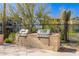 Outdoor grilling station with built-in barbecues, perfect for community gatherings at 5100 E Rancho Paloma Dr # 2078, Cave Creek, AZ 85331