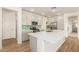 A stylish kitchen boasts a large island, stainless steel appliances, and a beautiful backsplash at 5100 E Rancho Paloma Dr # 2078, Cave Creek, AZ 85331