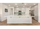 Bright, open kitchen boasts an oversized island, stainless appliances, and modern finishes at 5100 E Rancho Paloma Dr # 2078, Cave Creek, AZ 85331