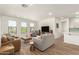 Open and bright living room features wood-look floors and plenty of natural light at 5100 E Rancho Paloma Dr # 2078, Cave Creek, AZ 85331