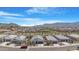 Aerial view of a modern home with desert landscaping, showcasing mountain views and a welcoming neighborhood at 5237 W Alta Mesa Ave, Laveen, AZ 85339