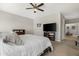 Comfortable primary bedroom with soft natural light, ceiling fan and neutral decor at 5237 W Alta Mesa Ave, Laveen, AZ 85339