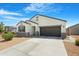 Neat single-story home featuring a two-car garage and low maintenance landscaping at 5237 W Alta Mesa Ave, Laveen, AZ 85339