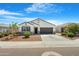 Charming single-story home with a well-manicured lawn and a two-car garage at 5237 W Alta Mesa Ave, Laveen, AZ 85339