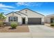 Well-maintained single-story home with gray accents and a two-car garage at 5237 W Alta Mesa Ave, Laveen, AZ 85339