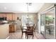 Cozy breakfast nook with outdoor access is adjacent to the kitchen at 553 W Hereford Dr, San Tan Valley, AZ 85143