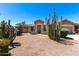 Inviting single-story home featuring desert landscaping with saguaro cactus and xeriscaping at 553 W Hereford Dr, San Tan Valley, AZ 85143