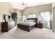 Spacious main bedroom featuring a vaulted ceiling, ceiling fan, and large windows at 553 W Hereford Dr, San Tan Valley, AZ 85143