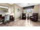 Home office filled with natural light, desk, and comfortable seating area at 553 W Hereford Dr, San Tan Valley, AZ 85143