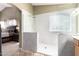 Large walk-in shower in the ensuite bathroom with tiled walls and glass door at 553 W Hereford Dr, San Tan Valley, AZ 85143