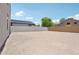 Spacious backyard with block fence and ample room for outdoor activities and landscaping at 5535 S 240Th Ln, Buckeye, AZ 85326