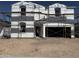 Two-story home under construction features scaffolding, ready for customization at 5535 S 240Th Ln, Buckeye, AZ 85326