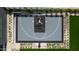 Aerial shot of basketball court with Jordan logo amidst lush green landscaping at 5814 E Camelback Rd, Phoenix, AZ 85018