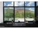 Modern kitchen with mountain views, marble countertops and stainless steel appliances at 5814 E Camelback Rd, Phoenix, AZ 85018
