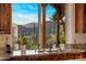A gourmet kitchen sink with a view of the desert landscape at 6001 E Restin Rd, Cave Creek, AZ 85331