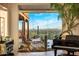Bright living room with floor to ceiling windows and grand piano at 6001 E Restin Rd, Cave Creek, AZ 85331