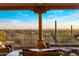 Breathtaking outdoor patio view featuring a serene desert landscape and comfortable seating at 6001 E Restin Rd, Cave Creek, AZ 85331