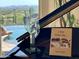 Close up on the piano, glass sculpture and desert landscape in the background at 6001 E Restin Rd, Cave Creek, AZ 85331