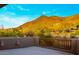 Picturesque view from patio showcasing desert flora, a majestic mountain backdrop, and clear blue sky at 6001 E Restin Rd, Cave Creek, AZ 85331