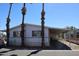 Charming single-story home with covered parking and palm trees at 625 W Mckellips Rd # 279, Mesa, AZ 85201