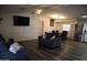 Inviting living room featuring modern furniture, stainless steel appliances, and hardwood floors at 625 W Mckellips Rd # 279, Mesa, AZ 85201