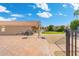 Paver patio with BBQ and basketball hoop offers an ideal outdoor space for Gathering fun and entertaining at 6763 W Wethersfield Rd, Peoria, AZ 85381