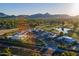 Aerial shot of the community featuring golf course, mountain views and desert landscaping at 7141 E Ironwood Dr, Paradise Valley, AZ 85253