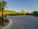 Gated community entrance featuring lush landscaping, security cameras and well-maintained surroundings at 7141 E Ironwood Dr, Paradise Valley, AZ 85253