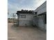 Exterior view of new construction shows a modern gray building with scaffolding at 7141 E Ironwood Dr, Paradise Valley, AZ 85253