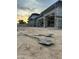 View of home exterior showcasing desert landscaping and modern architectural design in warm light at 7141 E Ironwood Dr, Paradise Valley, AZ 85253