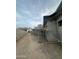 New construction shows a gray modern building with scaffolding and a dusty ground at 7141 E Ironwood Dr, Paradise Valley, AZ 85253