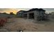 Two-car garage highlighting modern architecture and construction, scaffolding for finishing work at 7141 E Ironwood Dr, Paradise Valley, AZ 85253