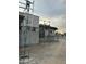 Exterior view of gray modern building under construction with scaffolding at 7141 E Ironwood Dr, Paradise Valley, AZ 85253