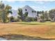 Scenic view of a lush green golf course with mountain views at 7141 E Ironwood Dr, Paradise Valley, AZ 85253