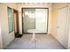 Cozy patio with sliding glass door and small round table, perfect for outdoor relaxation at 7575 E Indian Bend Rd # 1012, Scottsdale, AZ 85250