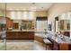 Primary bathroom with dual vanities, a soaking tub, and custom cabinetry at 8272 S Pecan Grove Cir, Tempe, AZ 85284