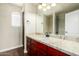 Stylish bathroom with granite countertop and a window for natural light at 1051 E Julie Ave, San Tan Valley, AZ 85140