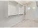 Spacious walk-in closet with ample shelving and hanging space for organized storage at 1051 E Julie Ave, San Tan Valley, AZ 85140