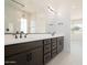 Contemporary bathroom with double vanity and a glass enclosed shower at 1336 E Cherrywood Pl, Chandler, AZ 85249
