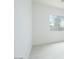 Bright bedroom with light floors and a window overlooking trees at 1336 E Cherrywood Pl, Chandler, AZ 85249