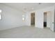 Spacious bedroom with wood-look floors and an ensuite bathroom at 1336 E Cherrywood Pl, Chandler, AZ 85249