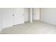 Bedroom with wood-look flooring and closet with sliding doors at 1336 E Cherrywood Pl, Chandler, AZ 85249