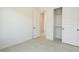 Bright bedroom with an open closet and tiled flooring providing style and function at 1336 E Cherrywood Pl, Chandler, AZ 85249